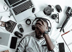 Two tech free hours Man being overwhelmed by technology