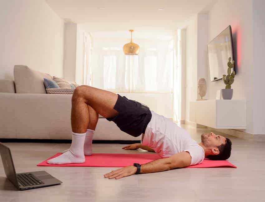 Man doing glute bridges