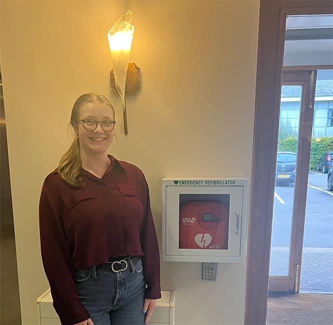 Penny Brohn UK with defibrillator donated by Westfield Health